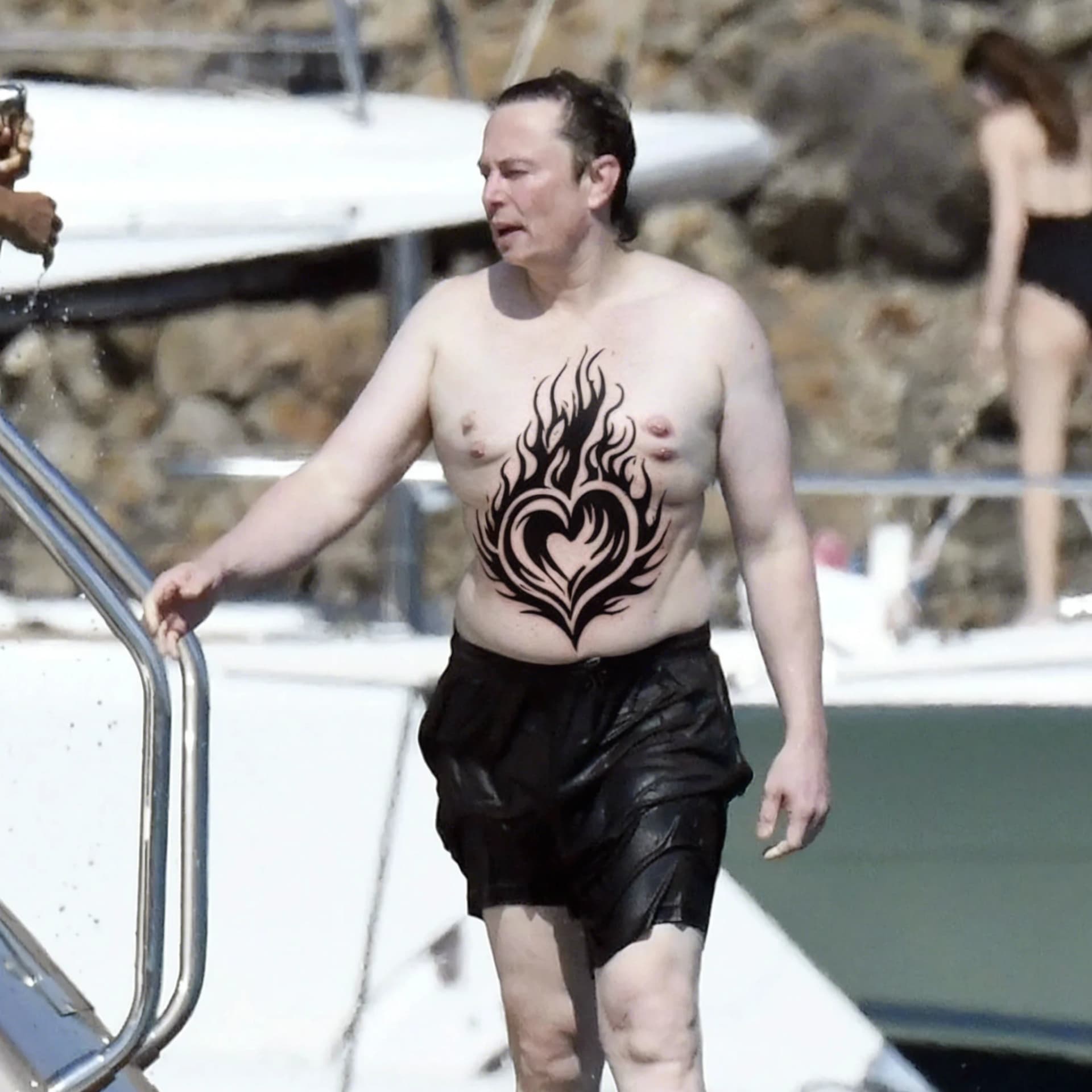 elon musk with tattoos