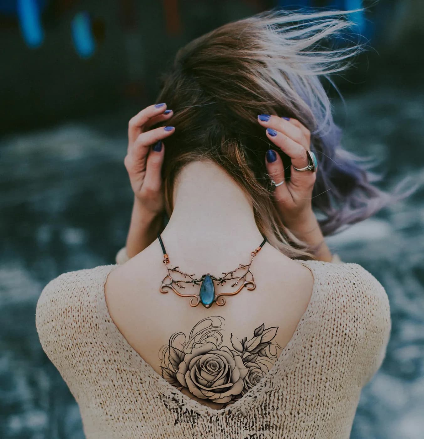 Rose tattoo previewed on a person's shoulder